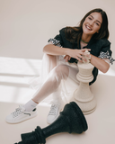 Sneakers in pelle con fondo chunky e dettagli grafici