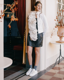 Sneakers in pelle con catenina decorativa