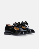 Scarpe da bambina nere in vernice Elisabetta Franchi La Mia Bambina in pelle con fiocco e cinturino a strappo.