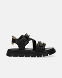 Sandali neri chunky in pelle con monogramma oro