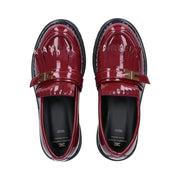 Mocassini in vernice con frange e logo dorato