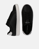 Sneakers minimal in pelle sintetica con logo laterale