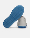 Sneakers essenziali con battistrada a contrasto