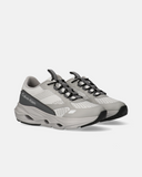 Sneakers con inserti in mesh e fondo stile running geometrico