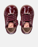 Sneakers bambina in vernice con glitter e fiocco gioiello