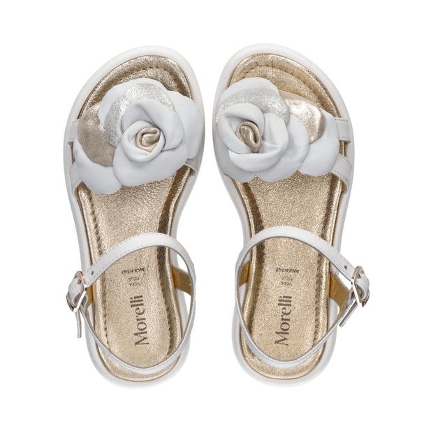 Leather sandals with floral accessory