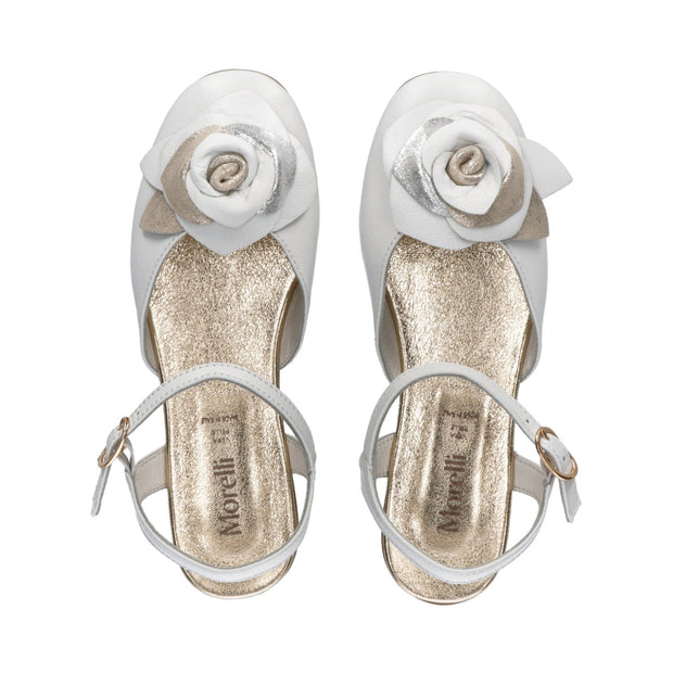 Elegant ballet flats with floral accessory