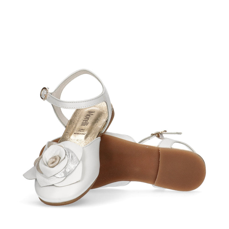 Elegant ballet flats with floral accessory