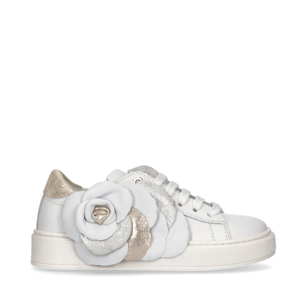 Leather sneakers with floral accessory