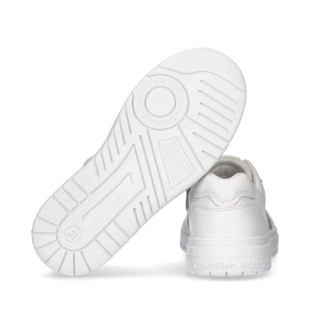 Sneakers minimal con logo iconico laterale